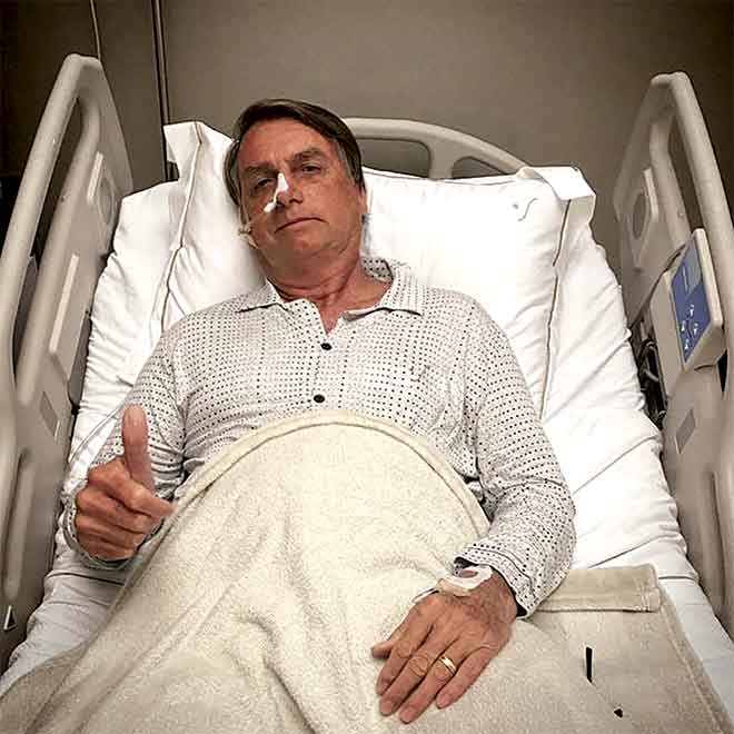 1º DIA ÚTIL Bolsonaro na cama do hospital
