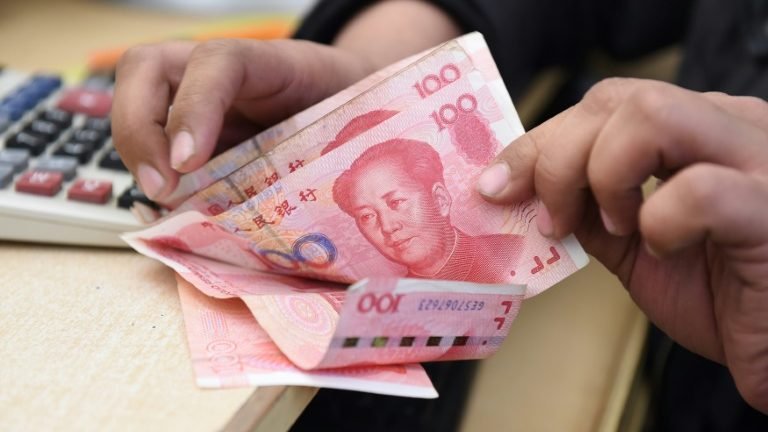 FMI reforça peso do iuan chinês como reserva internacional FMI reforça peso do iuan chinês como reserva internacional