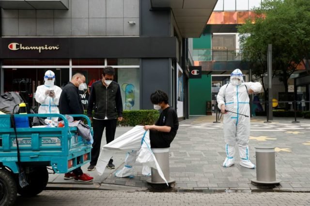 Beijing en una ‘carrera contrarreloj’ para contener la propagación del Covid-19